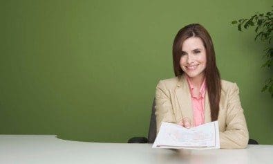 business woman handing resume