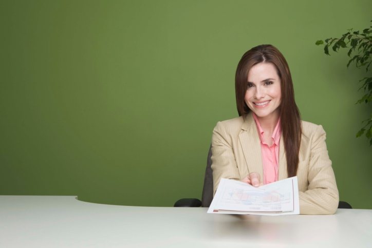 business woman handing resume